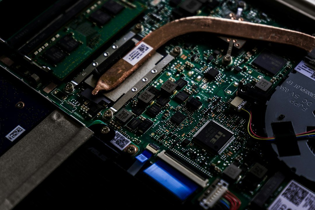 green-and-black-computer-motherboard-mx9axbkqkw8
